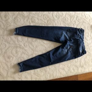 Distressed crop ankle jeans